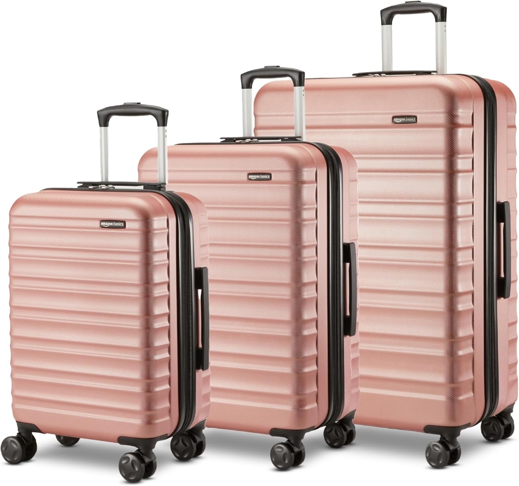 Amazon Basics rose gold 3-piece hardside spinner luggage suitcase set 20-inch carry-on 24-inch and 28-inch checked bags
