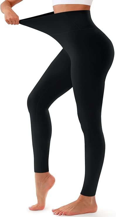 Woman stretching elastic black high-waisted tummy control athletic leggings