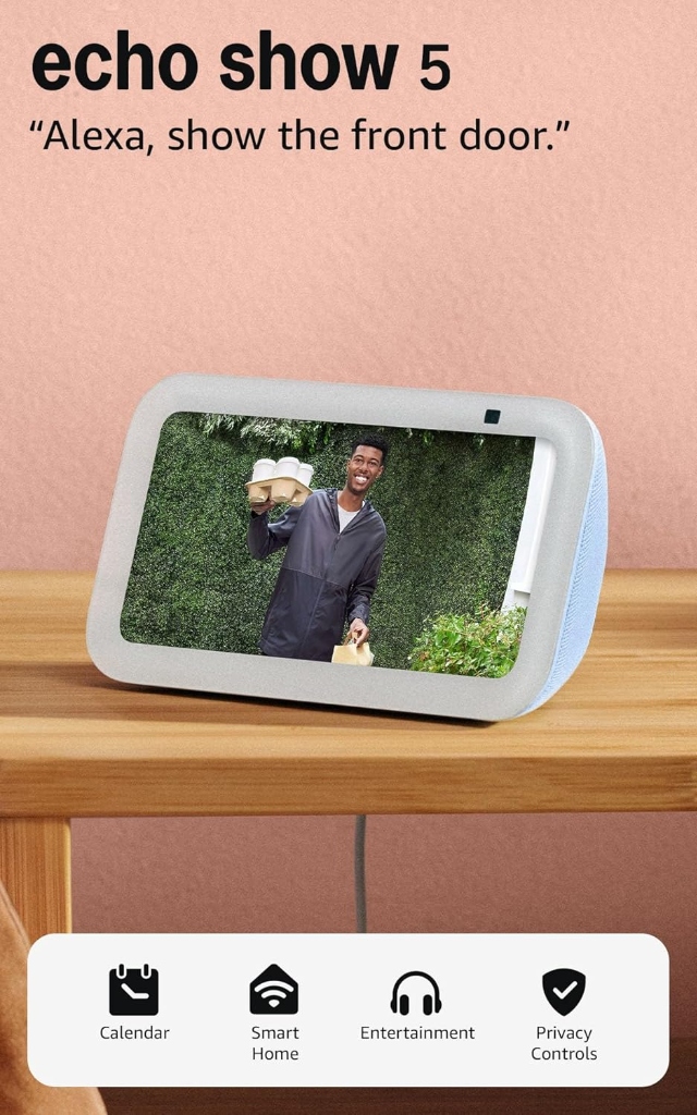 Amazon Echo Show 5 3rd gen compact smart display with Alexa showing security camera feed on nightstand